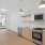 Kitchen with stainless steel appliances and wood floors