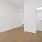 Bedroom with wood floors and walk-in closet