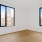 Spacious living room with wood floors and great views