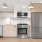 Kitchen with wood flooring and stainless steel appliances
